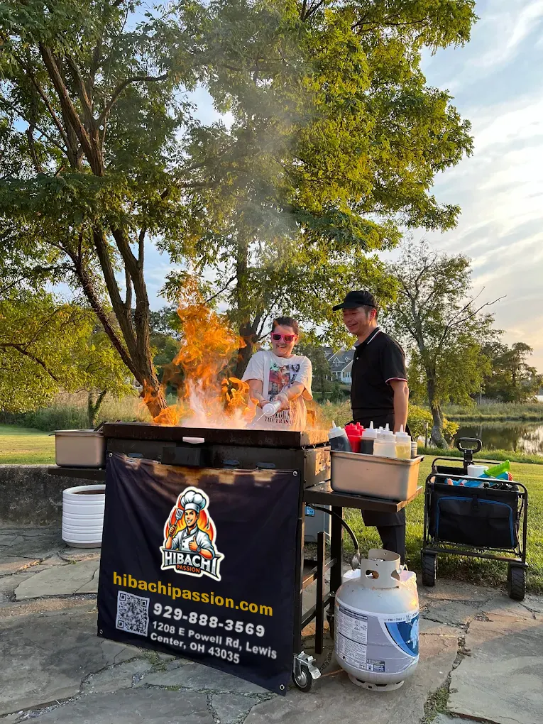 Fire show by our chefs in Lewis Center, OH Fire show by our chefs in Lewis Center, OH – hibachi at home party photo